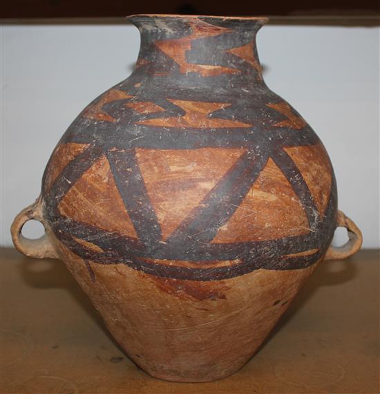 Chinese Neolithic pottery storage jar with geometric painted decoration